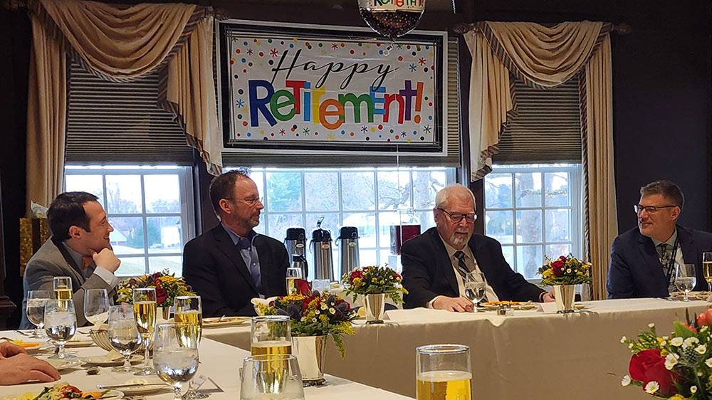 Jack Grady's retirement party - Jack speaking at a banquet table