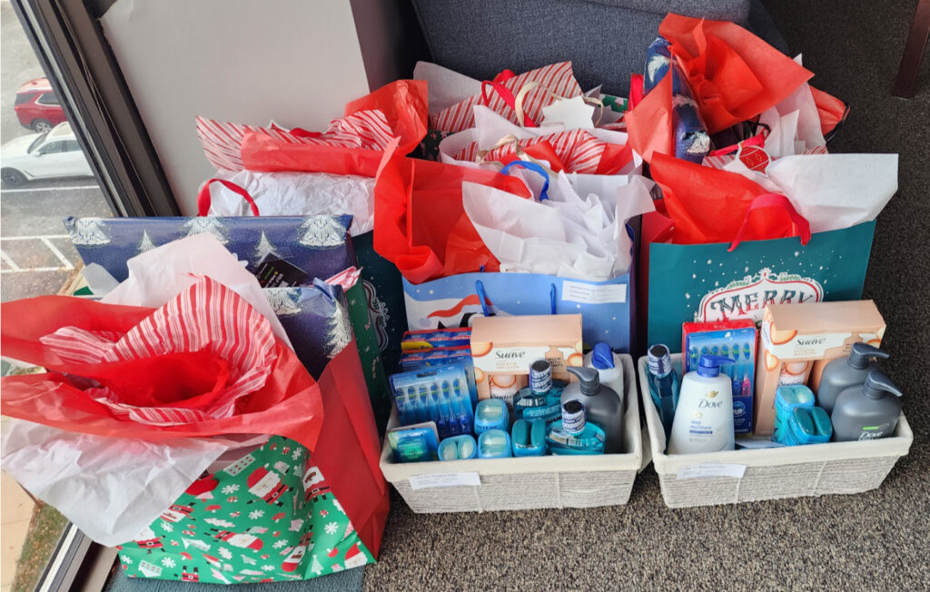 a collection of wrapped gifts ready for donation